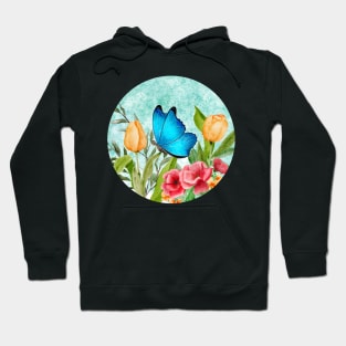 Blue butterfly flying in a garden Hoodie